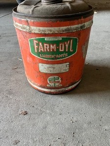 lot 26 image: Farm Oyl metal can