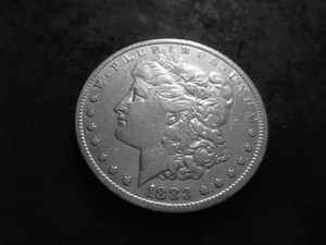 lot 12 image: 1883 CC Morgan Silver Dollar