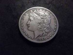 lot 16 image: 1884 S Morgan Silver Dollar