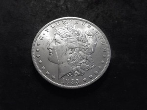 lot 18 image: 1885 O Morgan Silver Dollar