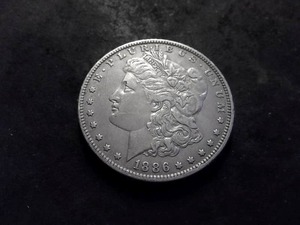 lot 20 image: 1886 O Morgan Silver Dollar