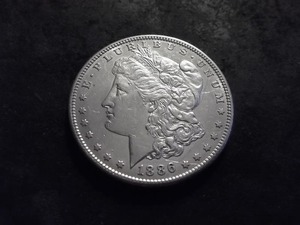 lot 21 image: 1886 S Morgan Silver Dollar