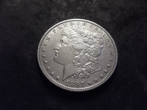 lot 31 image: 1897 O Morgan Silver Dollar