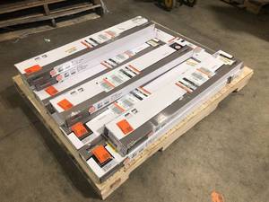 lot 2 image: 10 Boxes of TrafficMaster Walnut Ember Grey 4 MIL x 6 in. W x 36 in. L Peel and Stick Water Resistant Luxury Vinyl Plank Flooring (36 sqftcase) Customer Returns See Pictures