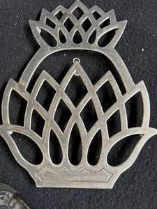 lot 13 image: Vintage Trivets and Iron Holder