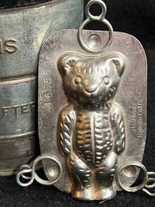 lot 16 image: Vintage Watkins Flour Sifter, Chocolate Mold