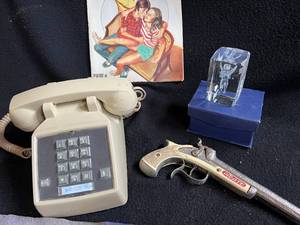 lot 24 image: Vintage Phone, National Lampoon Magazine, Pirate Cap Gun, and More