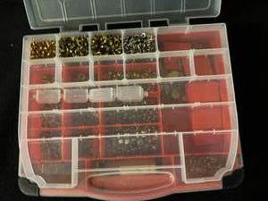 lot 49 image: Trivets & Zippers in Plano Tool Box