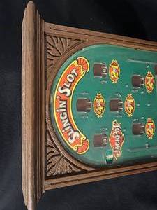lot 90 image: Vintage Slingin Slot Game