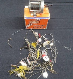 lot 31 image: VINTAGE SHAKESPEAR REEL PLUS