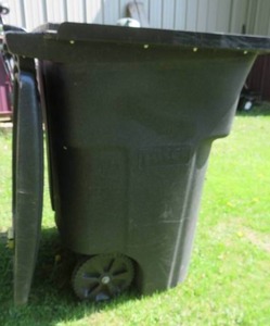 lot 70 image: TOTER BEAR RESISTANT TRASH CART  LOCKING