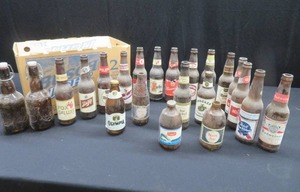 lot 76 image: VINTAGE BEER BOTTLE COLLECTION.