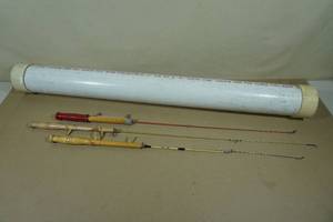 lot 103 image: PVC Tube Rod Holder with Ice Fishing Rods