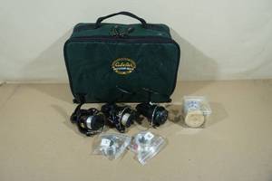 lot 112 image: Cabelas Bag with Mitchell Reels