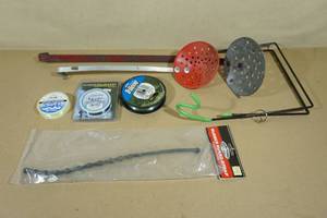 lot 135 image: Assorted Ice Fishing Accessories - Scoops, Holder, Line