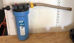 lot 129 image: RV Camco Levelers, Hoses, Camco Water Filter and More