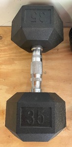 lot 92 image: Two 35 Pound Weights and an Adjustable Plate Weight