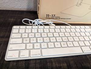 lot 74 image: Apple Keyboard and MacBookLaptop Stand