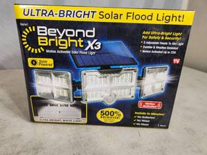 lot 86 image: New Beyond Bright X3 Motion Activated Solar Flood Light