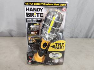 lot 115 image: New Handy Brite Cordless Work Light