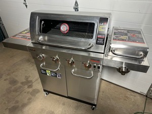 lot 1 image: Brand New Char-Broil Signature 4 Burner Duel Fuel Gas Grill