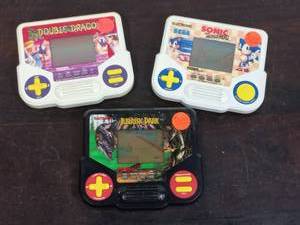 lot 52 image: Three Tiger Electronics Inc. Handheld Games