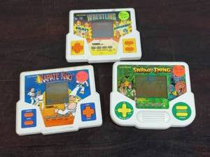 lot 57 image: Three Tiger Electronics Inc. Handheld Games