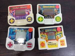lot 59 image: Four Tiger Electronics Inc. Handheld Games