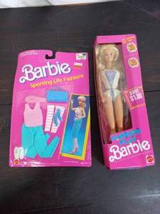 lot 75 image: Barbie Doll And Accessories