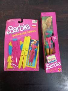 lot 76 image: Barbie Doll And Accessories