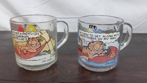 lot 110 image: Two McDonalds Collectibles Garfield Mugs