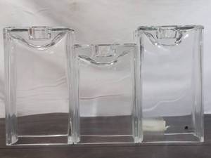 lot 149 image: Three JM Glass Co. Votives
