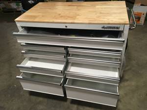 lot 5 image: Husky 46 in. W x 24.5 in D Standard Duty 9-Drawer Mobile Workbench Tool Chest with Solid Wood Top in Gloss White  Damaged  Customer Returns See Pictures