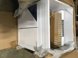 lot 13 image: Glacier Bay All-in-One Stainless Steel 24 in Laundry Sink with Faucet and Storage Cabinet in White Customer Returns See Pictures