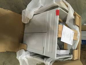 lot 34 image: Glacier Bay All-in-One Stainless Steel 24 in Laundry Sink with Faucet and Storage Cabinet in Cool Gray  Customer Returns See Pictures