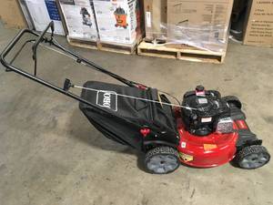 lot 40 image: Toro 21 in. Recycler Briggs and Stratton 140cc Self-Propelled Gas RWD Walk Behind Lawn Mower with Bagger Customer Returns See Pictures