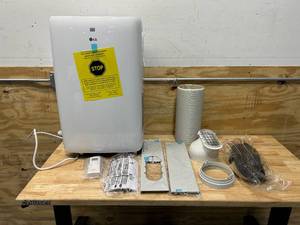 lot 4 image: LG 6,000 BTU (DOE) 115-Volt Portable Air Conditioner LP0621WSR Cools 250 Sq. Ft. with Dehumidifier Function and LCD Remote