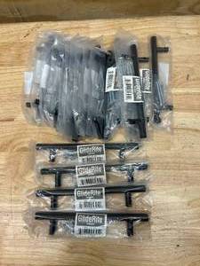 lot 51 image: GLIDERITE Lot of 19-  5 in. Matte Black Solid Cabinet Handle Drawer Bar Pulls
