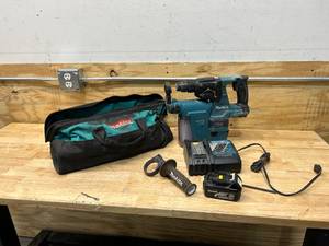 lot 57 image: MAKITA XRH01 Hammer Drill with DX01 HEPA Filter, Charger, 1 Battery and Carrying Bag