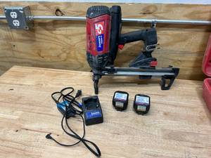 lot 100 image: POWERS Fasteners C5 Trak-It Nail Gun with Charger, 2 Batteries and Case