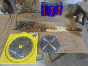 lot 172 image: Qty of 3 saw blades & painted saw. As shown.