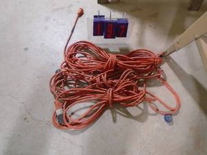 lot 197 image: Qty of 3 extension cords. Look like 2 at 25 & 1 at 50. As shown.