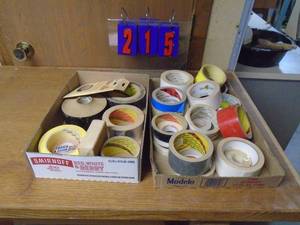lot 215 image: Qty of 2 flats of tape. As shown.