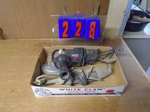 lot 228 image: Flat with Black & Decker angle grinder with chainsaw disc & mouse sander. As shown.