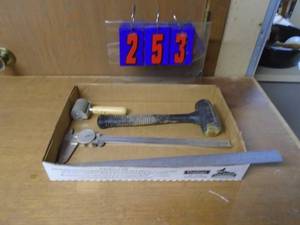 lot 253 image: Dead blow hammer & mitutoyo dial caliper approx 15 long. As shown.