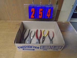 lot 254 image: Flat of pliers. As shown.