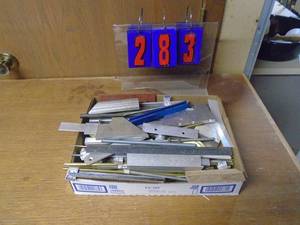 lot 283 image: Flat of round stock. Aluminum & brass etc. As shown.