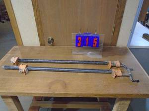 lot 315 image: Qty of 2 34 pipe clamps. Approx 3. As shown.