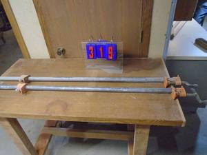lot 319 image: Qty of 2 34 pipe clamps. Approx 4. As shown.
