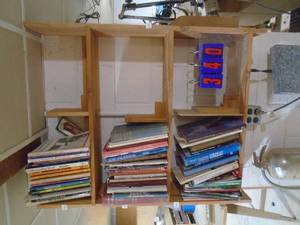 lot 340 image: Wood shelf book rack. Bring tools to remove, As shown.
